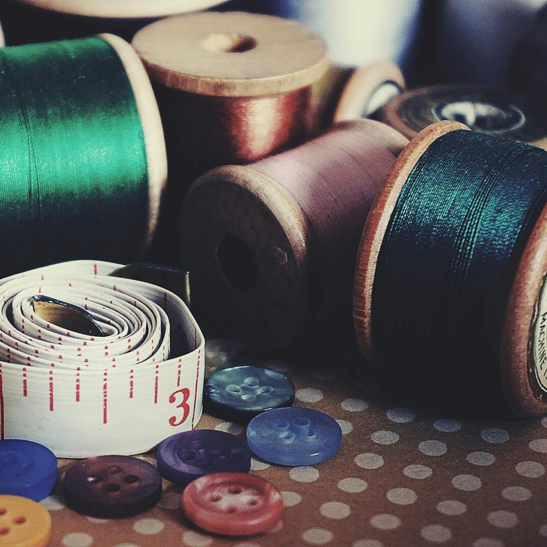 assorted color button pin on brown surface